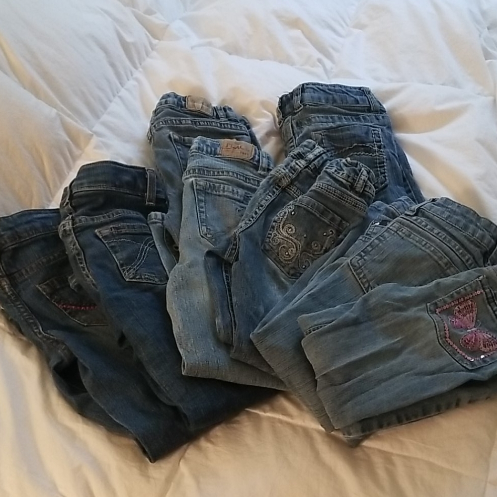 8 pairs of Jean's, all size 5. Various Brands.